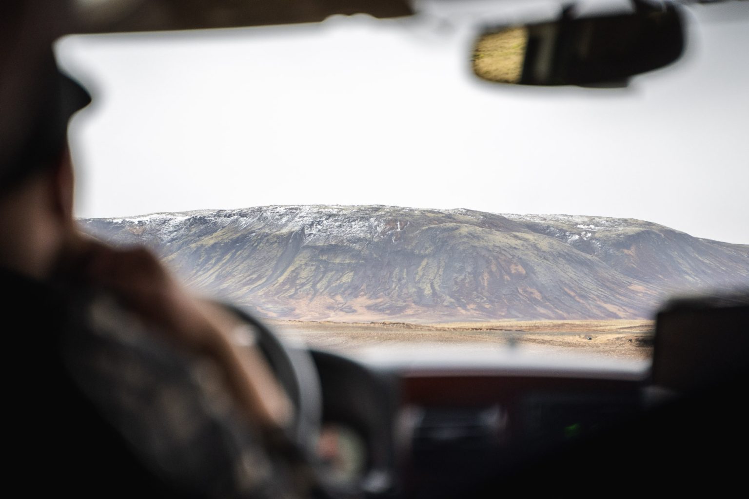 Photograph of a mountain through a car windscreen during the Iceland retreat